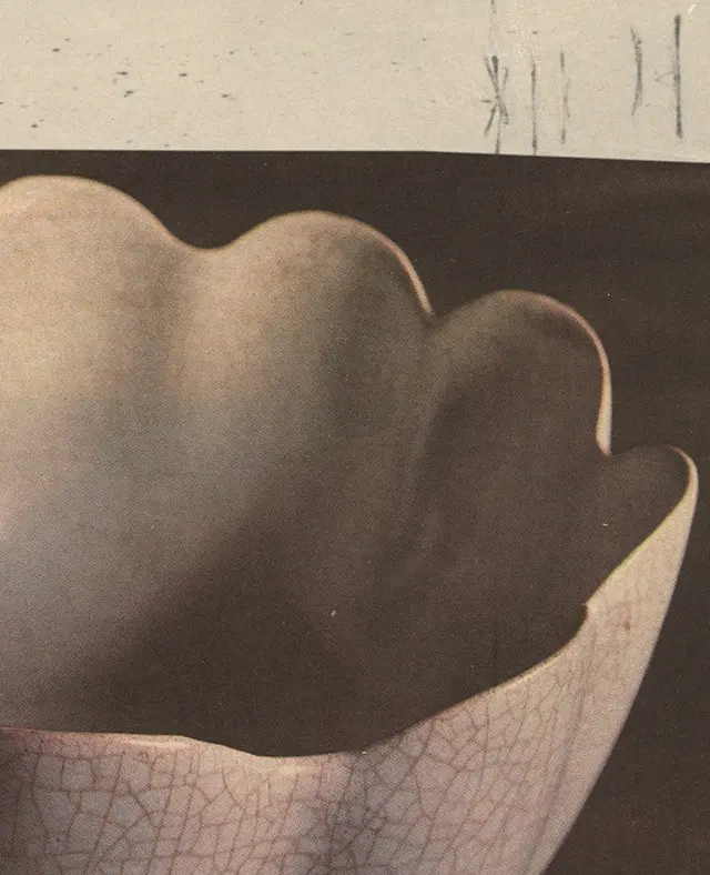 Reproduction of a photograph depicting a shell shaped sculptural object