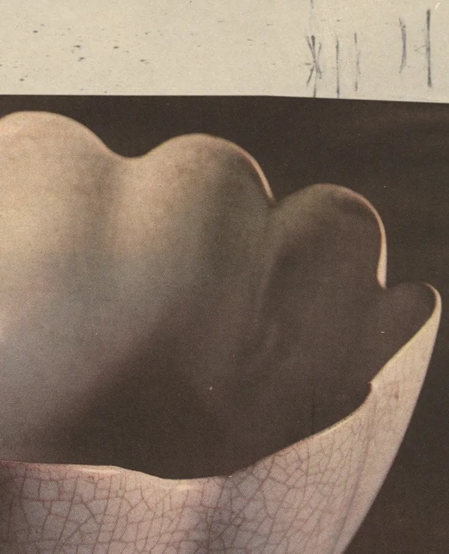 Reproduction of a photograph depicting a shell shaped sculptural object